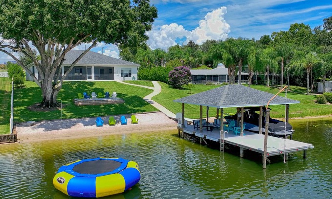 Lake Placid House | Newer Home on Lake June with Beach, Dock, Screened Patio and Hot Tub!