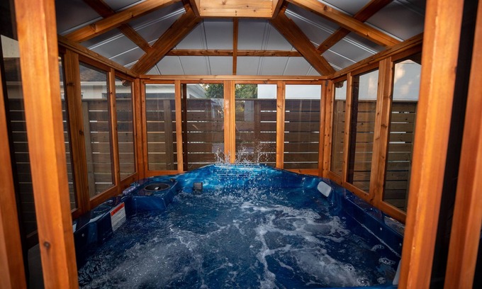 Colonialtown South House | Newly Constructed Modern Pet Friendly Zen Home W/Private Home Theater & Hot Tub! 1 Bedroom Home by RedAwning