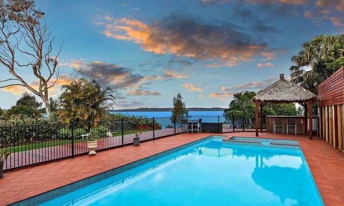 Toukley House | Newly renovated 4-bedroom lakefront home is perfect for your next family getaway