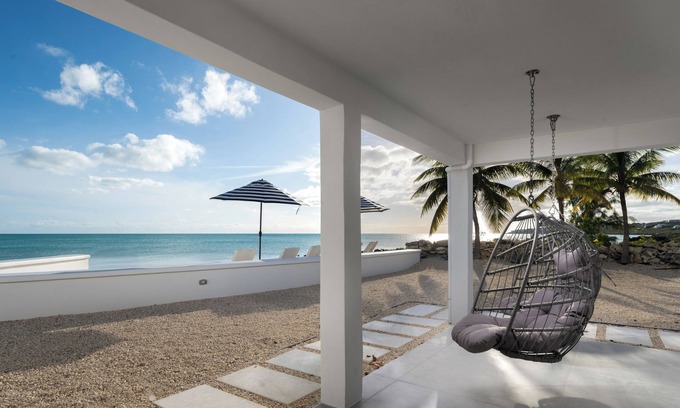 Venetian Road Settlement Villa | NEWLY RENOVATED 2BR Ocean Front Luxury villa