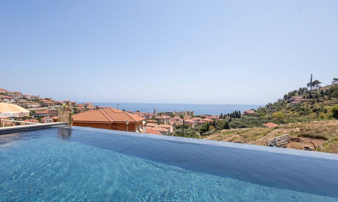 San Lorenzo al Mare Apartment | Nice apartment for 4 guests with pool, WIFI, A/C, TV, patio and parking