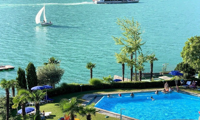 Bissone Apartment | Nice apartment for 4 guests with pool, A/C, WIFI, TV, balcony and panoramic view