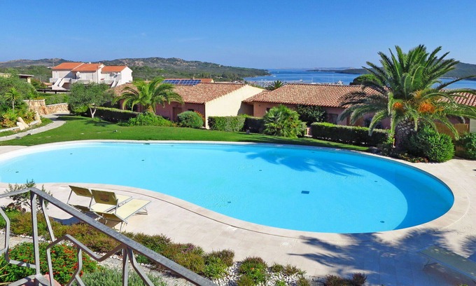 Porto Pozzo Apartment | Nice apartment for 6 guests with WIFI, pool, A/C, terrace, pets allowed and parking