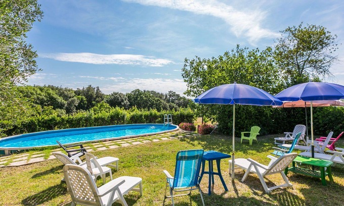 Follonica Villa | Nice apartment in villa for 12 people with WIFI, private pool, TV, patio, pets allowed and parking