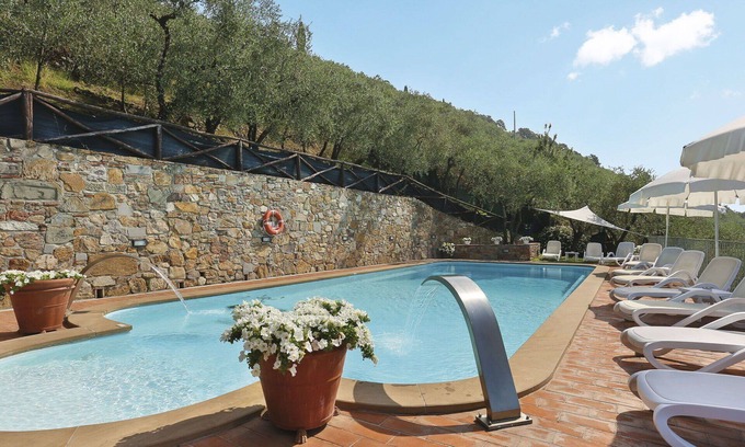 Buti Villa | Nice apartment in villa for 4 guests with pool, WIFI, TV, patio and pets allowed