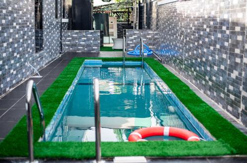 Abuja Apartment | NIFEWAT APARTMENT,Dijon studio apartment with pool,WiFi, gym,Netflix and sit out area
