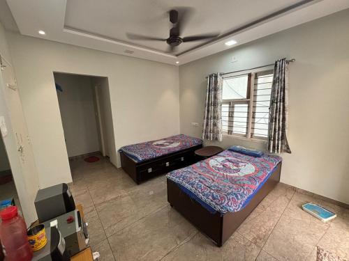 Infocity House | Nisarg Home Stay