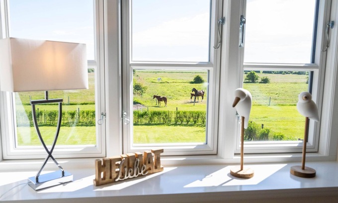 Borgsum House | "Nordseehaus Föhr: Comfortable vacation apartment for the whole family!"