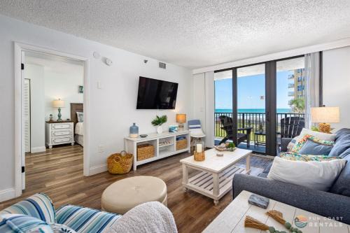 New Smyrna Beach Apartment | Ocean View Balcony just STEPS to the Beach with Pool, Parking and Wi-Fi!