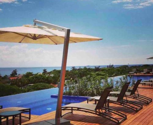 Playacar Apartment | Ocean View Pool in Exclusive Playacar, En-Suite Rooms