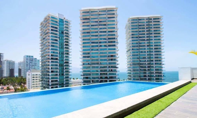 North Hotel Zone Apartment | Ocean View Roof Pool BBQ Gym, Walk to Beach