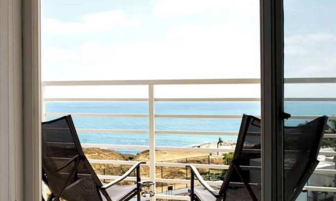 Playas Apartment | Oceanfront apartment, swimming pool, automatic check-in