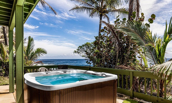 Keaau House | Oceanfront home with private hot tub, wraparound deck, ocean views, W/D & lanai
