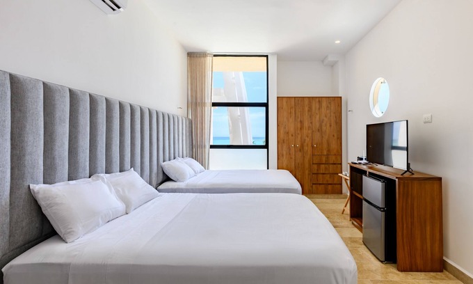 Telchac Puerto Apartment | Oceanfront Studio with a Pool, WIFI, Central A/C, Great Location