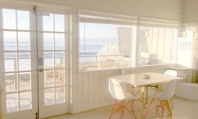 Los Angeles County House | Oceanfront Vintage Malibu Beach Bungalow at the beach with large OceanFront Deck