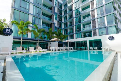 Bang Tao Apartment | Oceanstone by Holy Cow, 2-BR, 60 m2, tree view