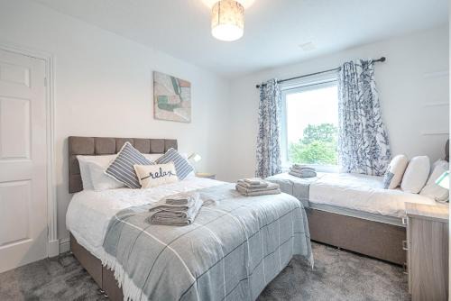 Cockett House | Off Road parking, Garden, TV in Every Room