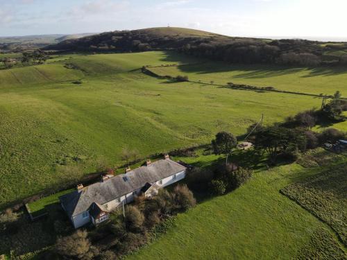 Totland Bay House | Old Coastguards - Stunning Historic Cottage