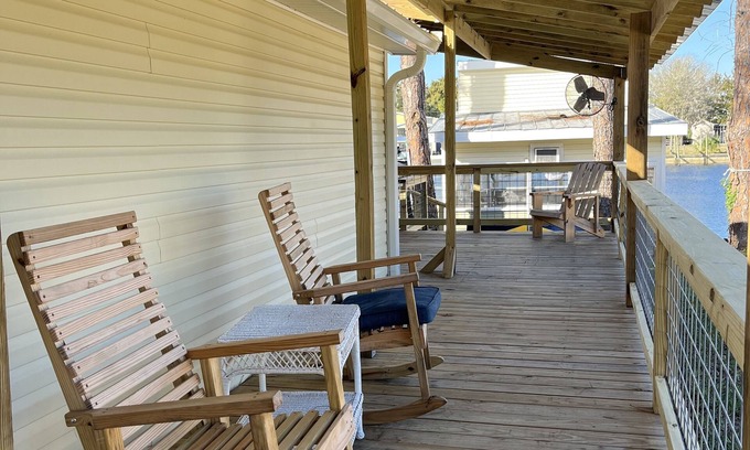 Suwannee House | Old Florida Waterfront Getaway - Large Porch, Big Dock, & Pet Friendly