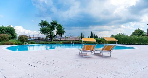 Rivoltella Apartment | Oleandro Apartment - Featuring a Private Garden and Access to 5 Pools