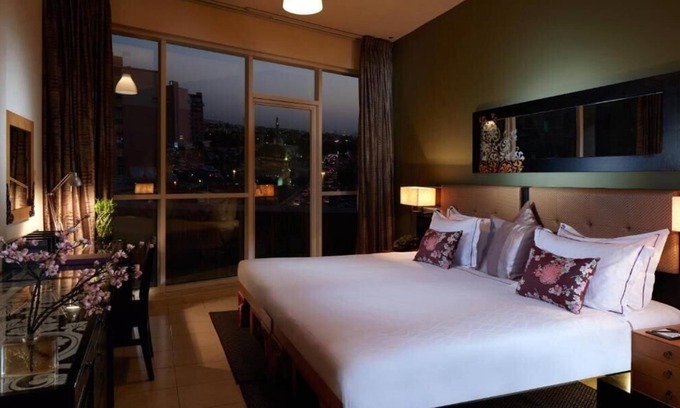 Discovery Gardens Hotel | One Bedroom Apartment In Discovery Gardens By E R