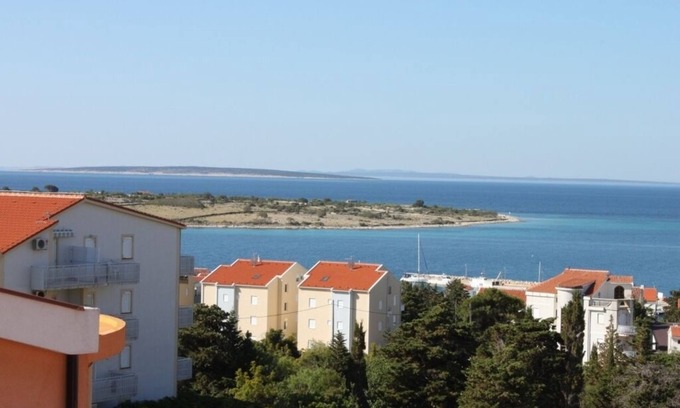 Novalja Apartment | One bedroom apartment with balcony and sea view Novalja, Pag (A-6341-e)