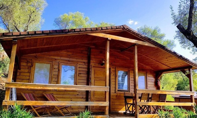 Porto Pollo Ski Chalet | One-bedroom chalet with sea view