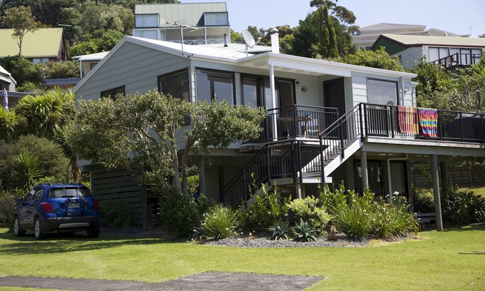 Onemana House | ONEMANA. Premium location. Walk across the road to the beach.