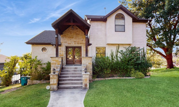 Burnet House | Opulent waterfront home with dock, firepit & stunning river view