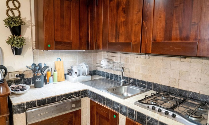 Campitelli Apartment | Original church converted into a dwelling, at the Colosseum, Historic Roman Center.