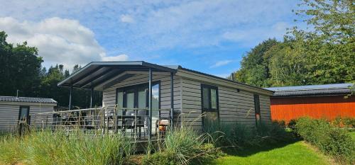 Gronenberg House | Ostseecamp Lübecker Bucht Ferienhaus "JU-LI" mit kostenlosen Saunazugang