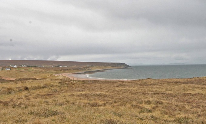 South Erradale Cottage | Overlooking the sweeping sandy bay of Opinan on the stunning west Highland coast .