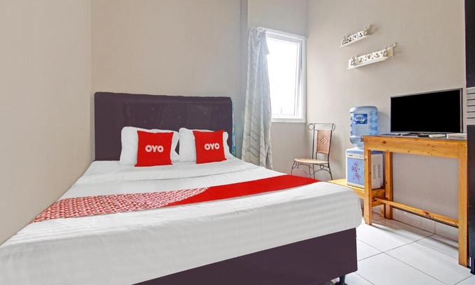 Tangerang Hotel | OYO 90554 Djaco Room