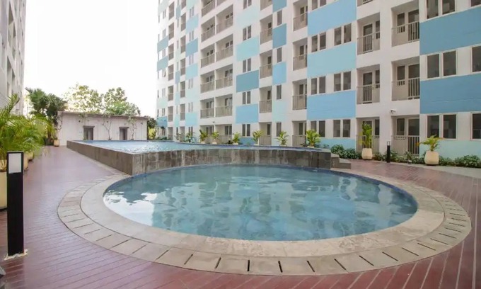 Karawang Hotel | OYO Life 93139 Apartemen Grand Sentraland By Evi