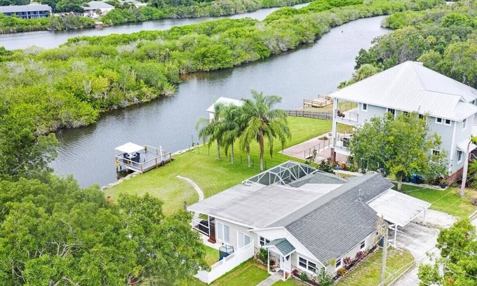 Tillman House | Palms Paradise. Heated Pool. Waterfront. Near Space Coast Beaches.