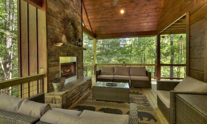 Cherry Log Cabin | Papa Bear Lodge is a Pet-friendly haven featuring hot tub, outdoor fireplace, firepit, pool table, WiFi, and secluded ambiance for unparalleled relaxation