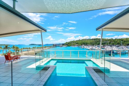 Hamilton Island Apartment | Pavillions Penthouse 25 - Luxury Waterfront Apartment with Private Roof top pool and buggy