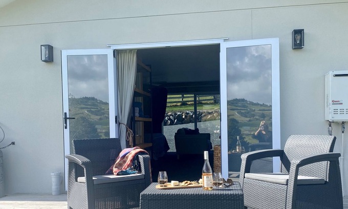 Mangawhai Cottage | Peaceful Cozy Cottage at Lazy Acres. 12 minutes to a wonderful surf beach.