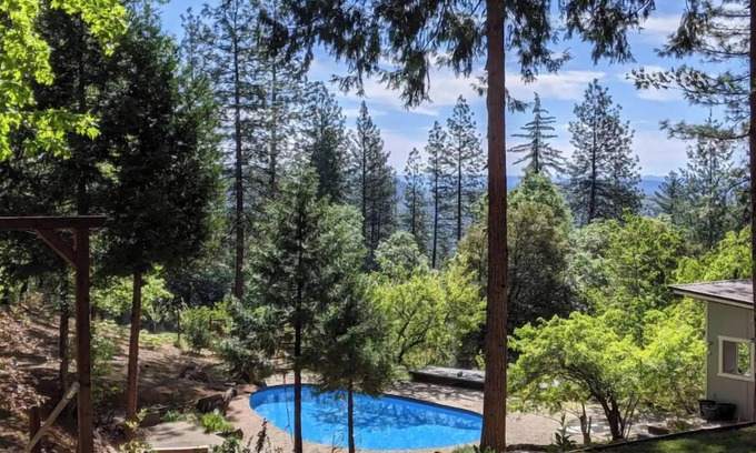 Cedar Ridge House | Peaceful Forest Retreat w/Pool, Game Room, EV Charger. Pet friendly!