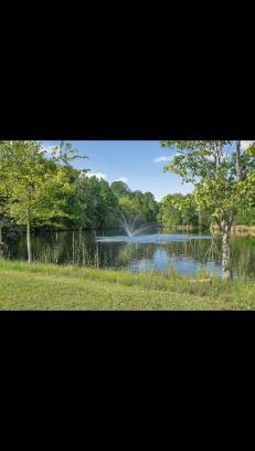 Midway Apartment | Peaceful Lakefront Getaway with Hot Tub & Fire Pit