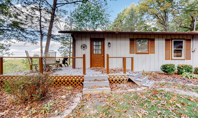 Wisconsin Dells House | Peaceful river view home with a furnished deck, firepit, central AC, & WiFi