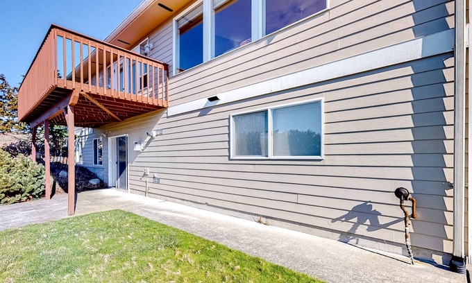 Oak Harbor House | Peek-a-boo ocean view home with in-law suite, fireplace, & outdoor space