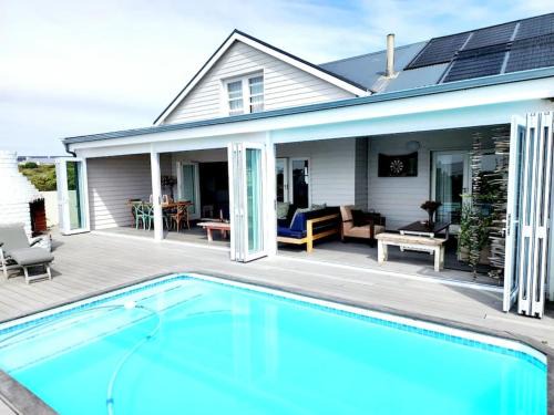Grotto Bay House | Penguin's at Sea