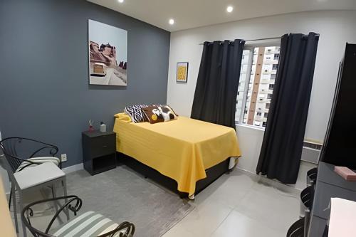 Embare Apartment | Pequeno Paraíso: Kitnet Aconchegante em Santos