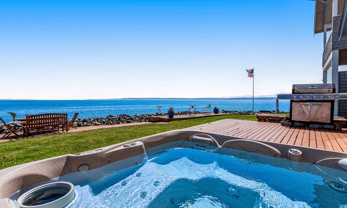 Clinton House | Perfect beach house with stunning views, hot tub & firepit - steps to the water