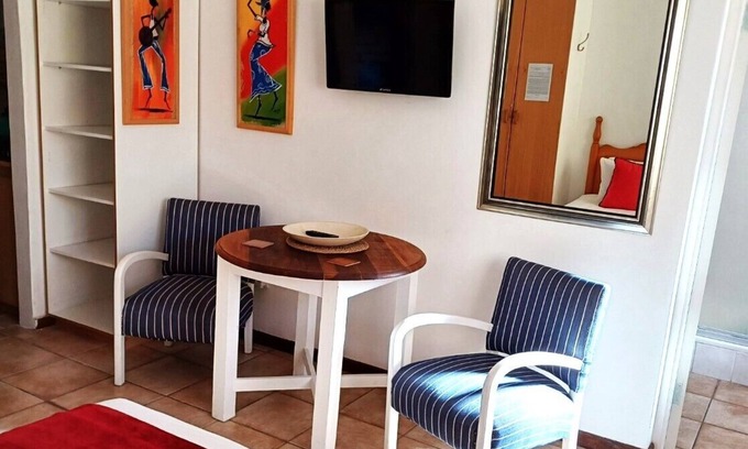 Kleinmond Apartment | PERIWINKLE 5: Bachelors apartment, own BBQ area, near BEACH and SHOPS