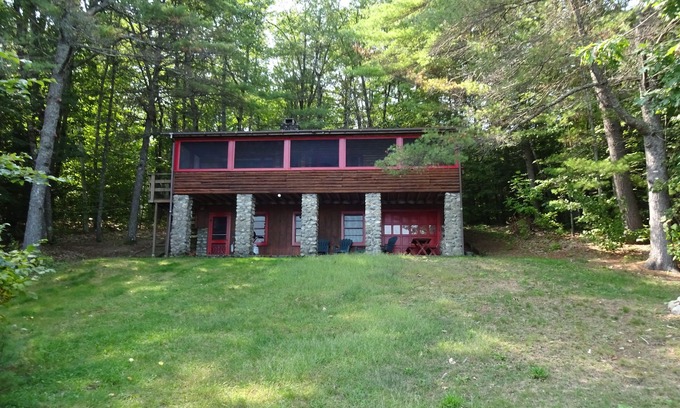 Naples Cottage | Pet friendly, cozy Maine log cabin surrounded by woods with beautiful views!