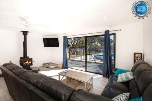Culburra Beach House | Pipers Spot - Pet Friendly - Fireplace with Swimming Pool
