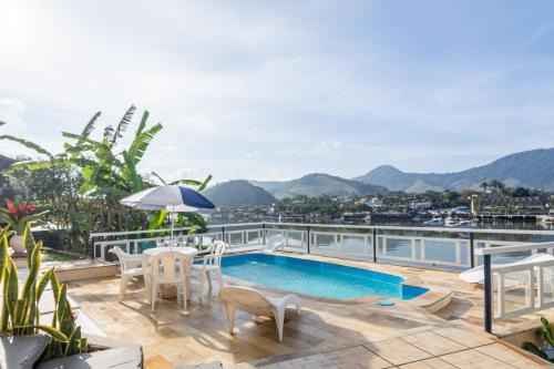 Caieira House | Piscina, caiaque e sauna em praia privativa