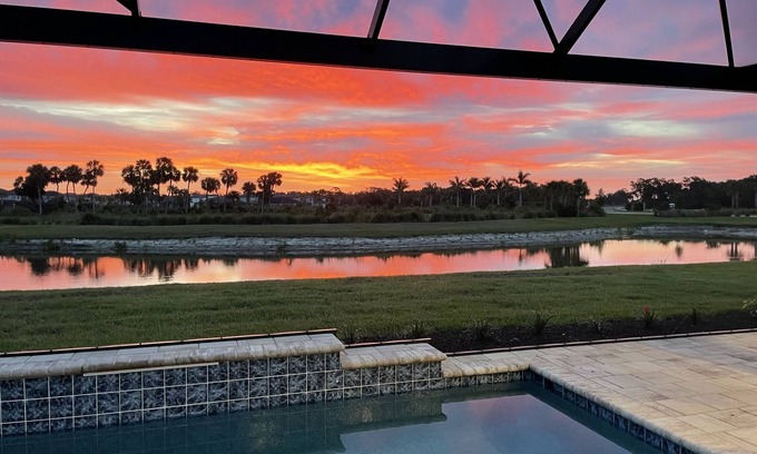 Sarasota House | Pool House Overlooking Lake on Skye Ranch